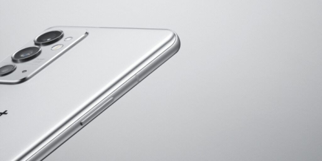 https://s3b.cashify.in/gpro/uploads/2021/10/08052314/OnePlus-9RT-Back-1024x512.jpg
