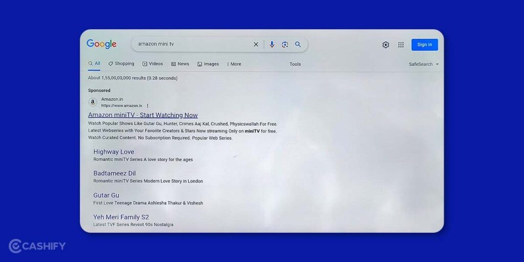Select the link for Amazon Mini TV in the Google search results using the onscreen pointer with the remote.