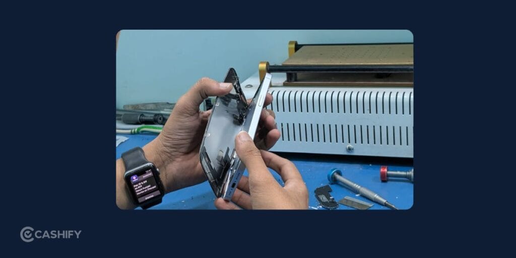 technician repairing phone